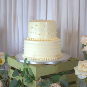 TWO TIER WHITE IVORY PEARL WEDDING CAKE